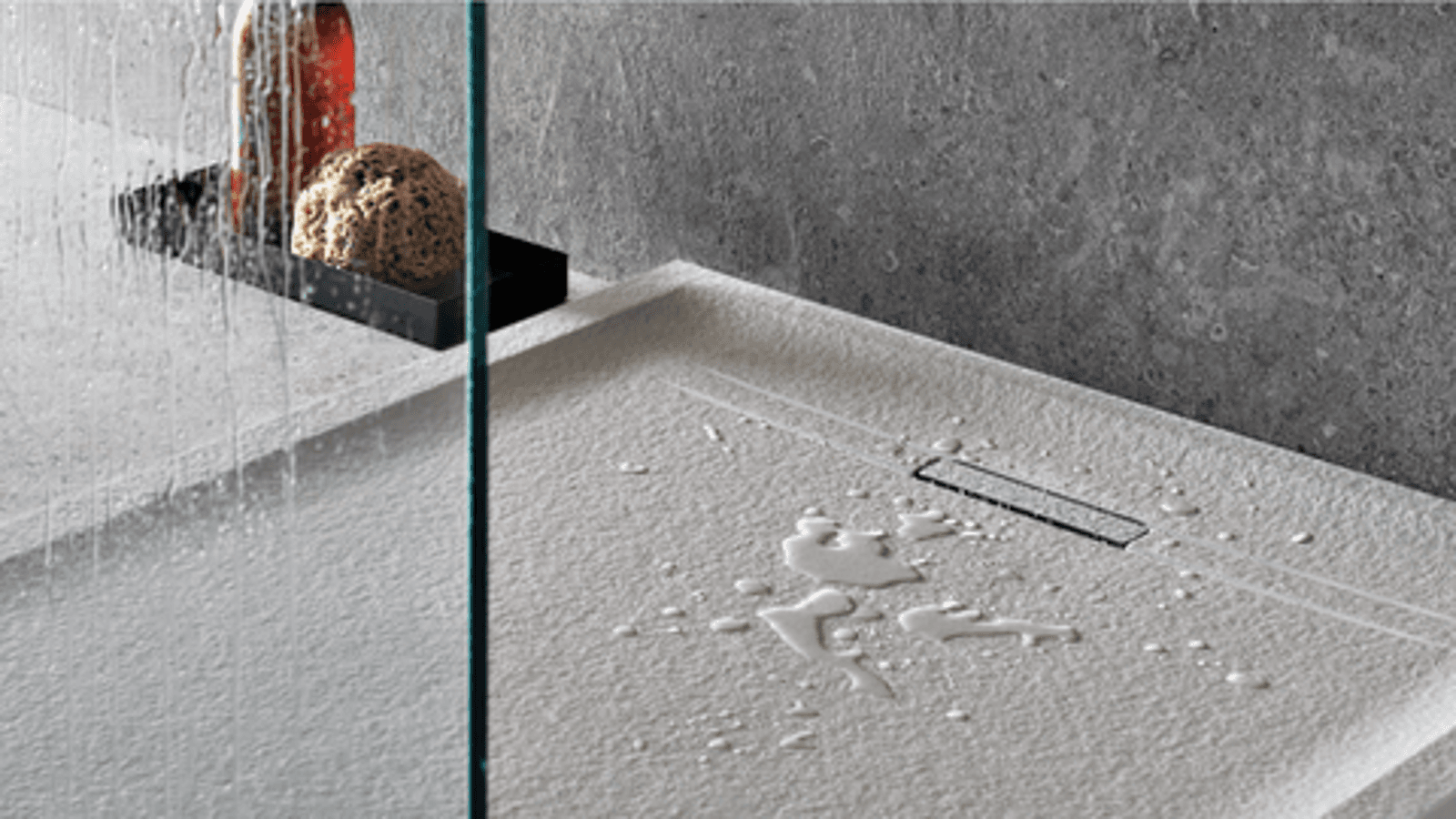 Teksturowana i antypoślizgowa powierzchnia brodzika Geberit Sestra w kolorze szarym Teksturowana i antypoślizgowa powierzchnia brodzika Geberit Sestra w kolorze szarym