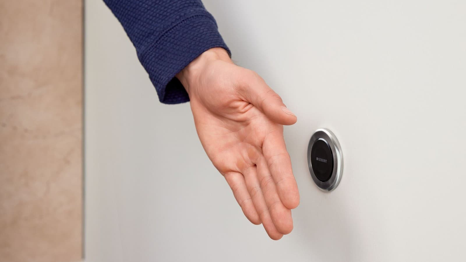 Dłoń przy bezdotykowym zdalnym uruchamianiu spłukiwania Geberit Typ10, okrągły Dłoń przy bezdotykowym zdalnym uruchamianiu spłukiwania Geberit Typ10, okrągły