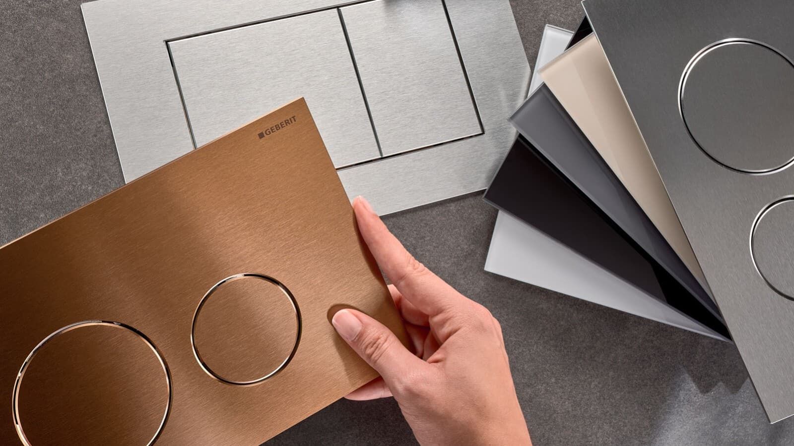 Przyciski spłukujące Geberit Sigma40 w różnych powierzchniach i kształtach Przyciski spłukujące Geberit Sigma40 w różnych powierzchniach i kształtach